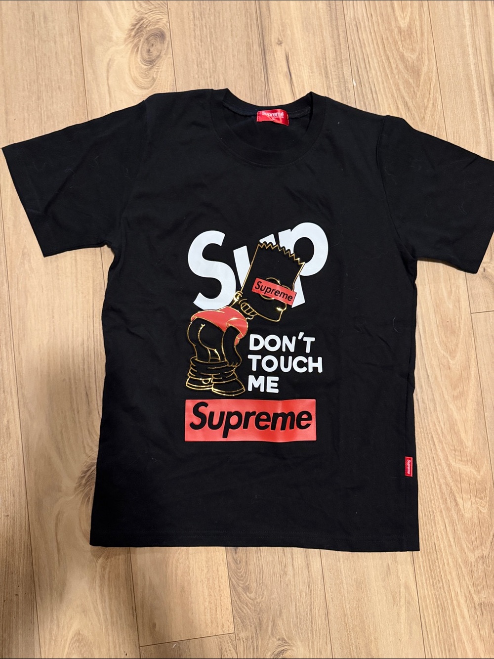Supreme Black Tee with Red and White Graphic